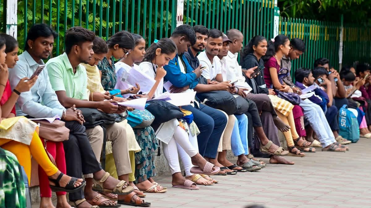 Karnataka police recruitment aspirants protest alleged exam irregularities
