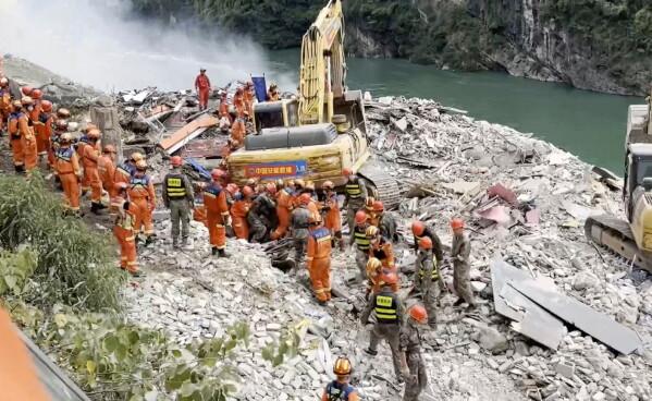 At least 8 killed in China landslide, search continues amid heavy rain