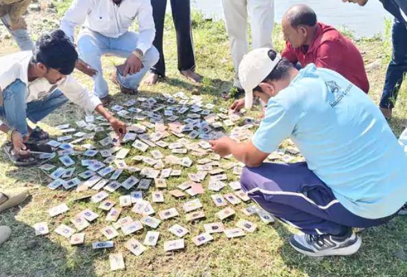 MP: Over 340 voter ID cards found along Narmada river, Congress demands FIR