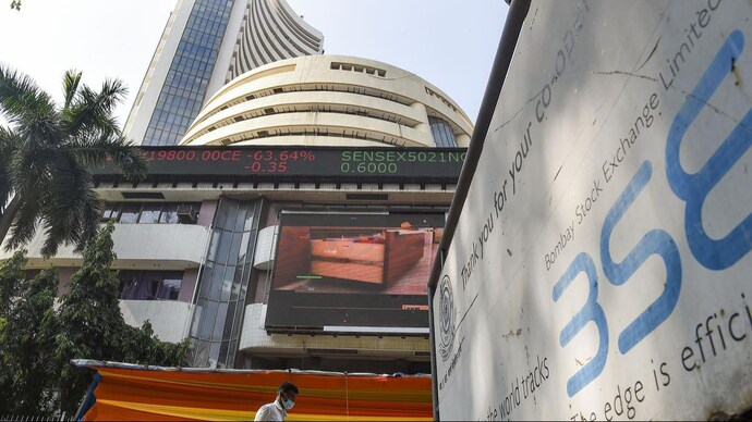 Sensex rebounds nearly 100 points to hit lifetime high; Nifty scales record intra-day level