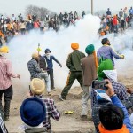 Farmers halt march to Delhi after Haryana police use teargas during protest