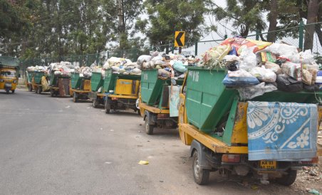 Protest by outsourced workers: CMC officials turn garbage collectors in Sirsi